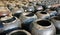 Large clay pots standing in rows in Myanmar