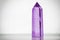 Large clear great royal crystal of quartz chalcedony on white background close up with a purple lilac shade of color