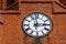 Large clock close-up on one of the towers of the church