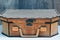 Large closed brown wooden casket chest