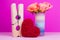 Large clothespin, heart and flowers in bright vase