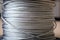 Large coil of steel cable, steel braided cable
