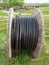 Large coil with wire for electric power in nature