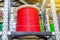 Large coils with colored electrical wires on huge shelves in an