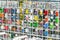 Large coils with colored electrical wires on huge shelves in an
