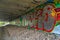 Large colorful graffiti under a bridge