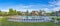 Large community pool at Daybreak, Utah with lounge chairs and closed outdoor umbrellas