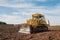 Large construction bulldozer at a construction site