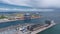 Large container cranes at a shipping terminal in the port of Copenhagen. Aerial panoramic view.
