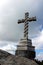 A large cross of the observation platform Cruz Alta and the Pena Palace in the distance