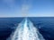 Large Cruise Boat rooster tail and smoke in the Pacific Ocean