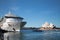 Large cruise ship in front of the Sydney Opera House, waterfront and blue sky, Sydney,