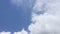A large cumulonimbus cloud covering the blue sky.