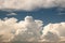 Large cumulous clouds fill the blue sky in Colorado