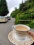 large cup of first flush organic orange pekoe Darjeeling and Assam tea in the bone china cup.