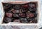 Large dates in a cardboard box top view.