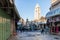 Large decorative fountain in the square and the bell tower of Alexander Nevsky church in old city of Jerusalem, Israel