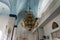 Large decorative gilded lamp hanging in the St. Nicholas church in Bayt Jala - a suburb of Bethlehem in Palestine