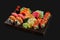 A large, diverse set with sushi, fresh sashimi and Philadelphia roll. Sushi with tuna, eel and salmon, shrimp, tuna, scallop and