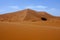 Large dunes in the Sahara deformed by the wind, Morocco