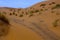 Large dunes in the Sahara deformed by the wind, Morocco