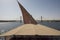 Large egyptian dahabeya river boat sailing on Nile