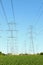 Large electrical pylons holding high voltage electrical wires.