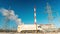 Large electrical substation and the smoke from the chimneys, time-lapse