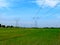 Large electricity poles on a sunny morning