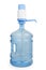 A large empty bottle for water with pump