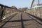 Large empty wooden bridge stretches into the distance close