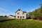 Large exterior of a country house in summer