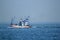 Large fishing boats in the sea.