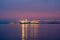 Large five-masted passenger ship on delightful pink sunset