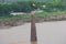 Large Flag and Lamp Post at Narmada River near Barwaha