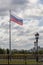 Large flag of Russia flutters in the wind in Victory Park in Moscow