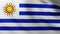 Large Flag of Uruguay fullscreen background fluttering in the wind