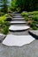 Large flagstone steps in a sunny summer garden