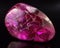 A large flat magenta stone revealing crystalline patterns in the light. Trendy color of 2023 Viva Magenta.. AI