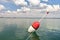 Large float on a calm surface of the sea as a symbol of successful fishing