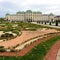 Large flowerbed in front of a beautiful building