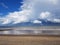 Large fluffy clouds over the Hornsea beach East Yorkshire England uk