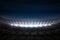 Large football stadium under night sky