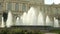 Large fountain gushing up water, in front of Odessa Opera and Ballet Theater.
