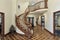 Large foyer with circular staircase