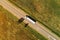 Large freight transporter semi-truck on the road, aerial view