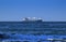 Large Freighter in the Distance Crossing the Indian Ocean, Off the Coast of Durban, South Africa