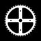 Large Front Bicycle Cog Over A Black Background