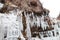 Large frozen icicles on site of waterfalls in mountainous area