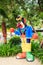 Large Funny Colorful Sculpture of Clown in Park